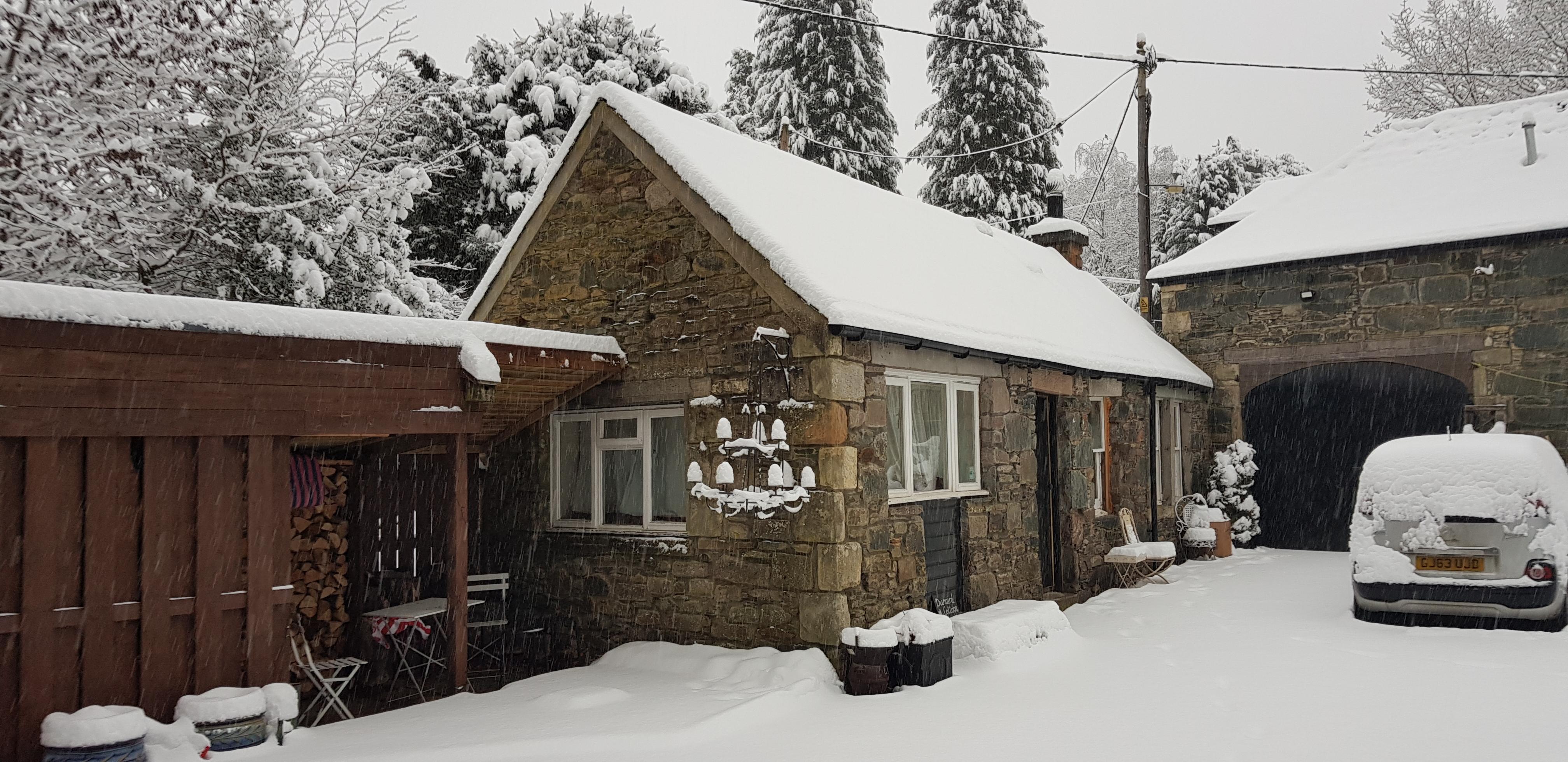 cottage snow exterior image